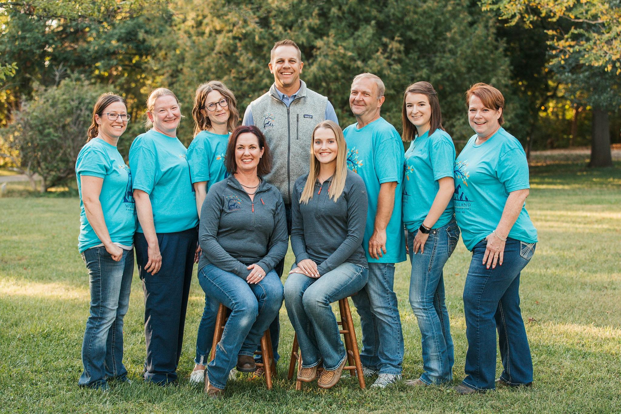 veterinary team standing together for a group photo outside